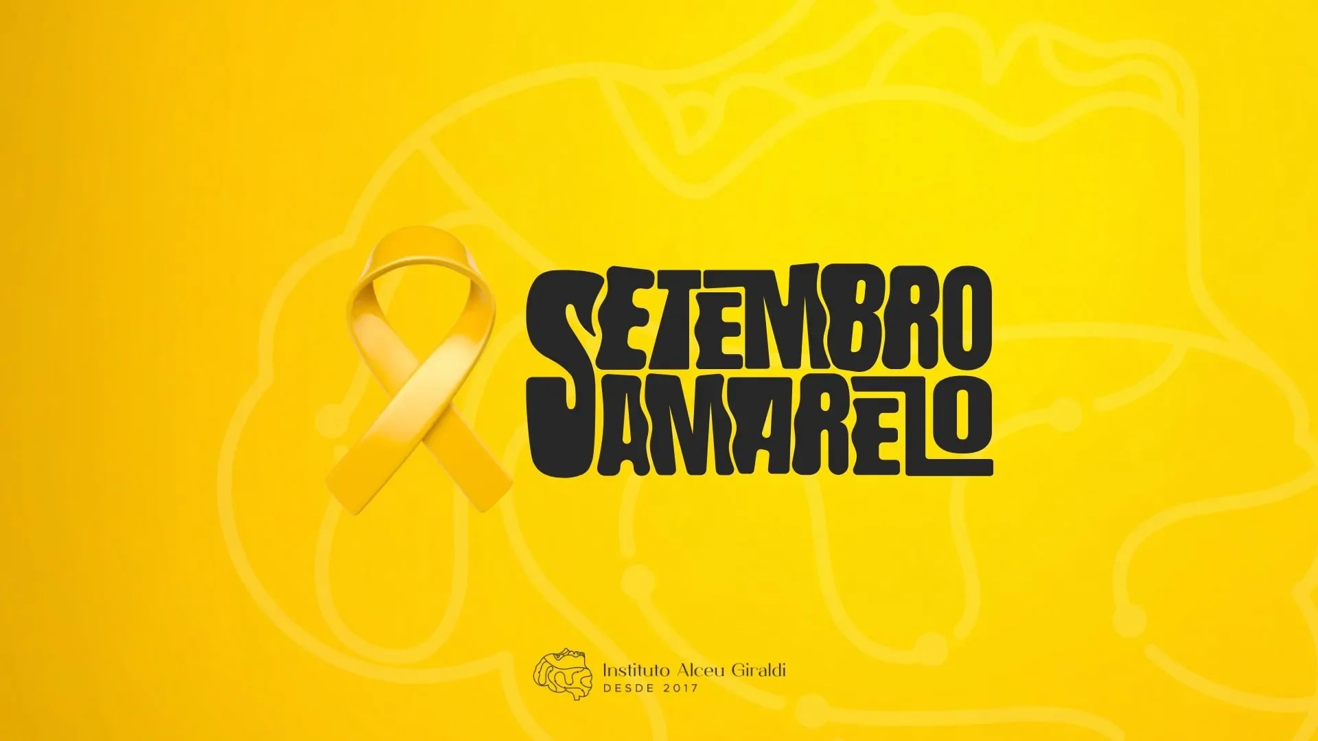 Laço amarelo sobre superfície neutra simbolizando a campanha Setembro Amarelo de prevenção ao suicídio