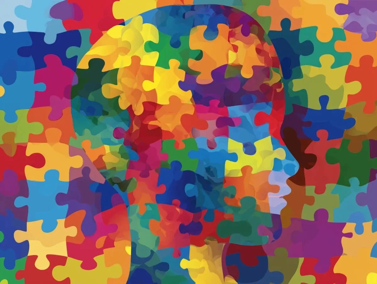 Símbolo do espectro autista junto a documento ilustrando direitos legais da pessoa com autismo